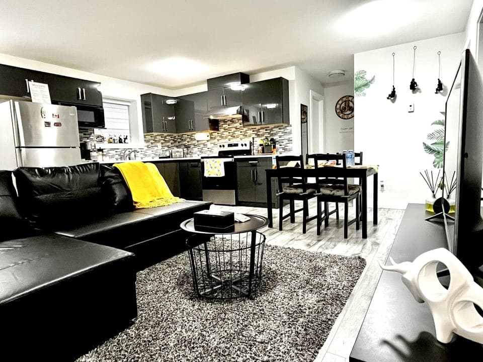 Living room with comfortable leather sofa bed, LG TV with over 2000 channels. 