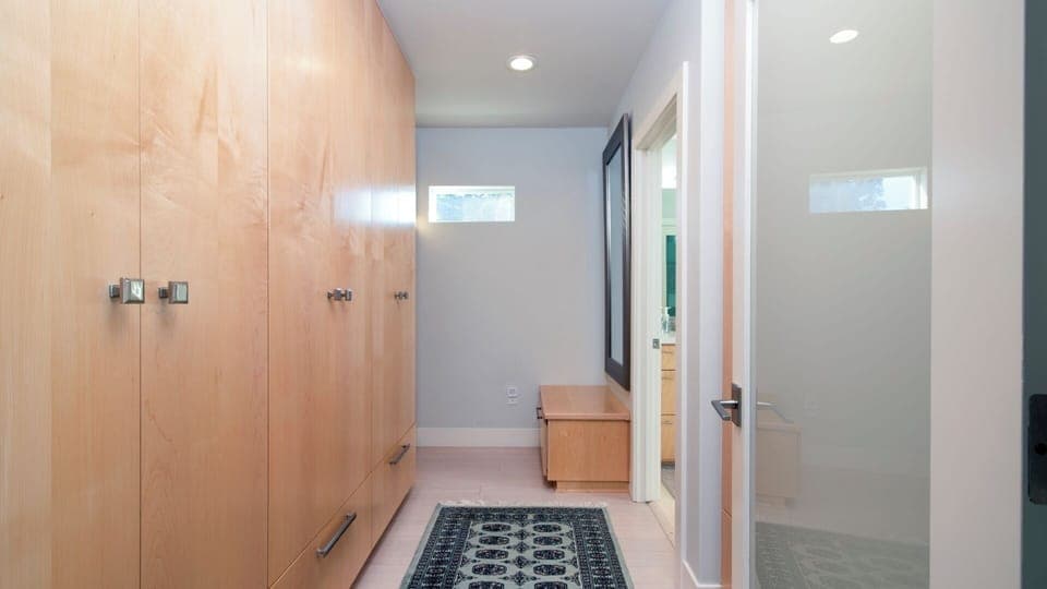 There is a large closet area in the master bedroom. This hall leads to the master bathroom.
