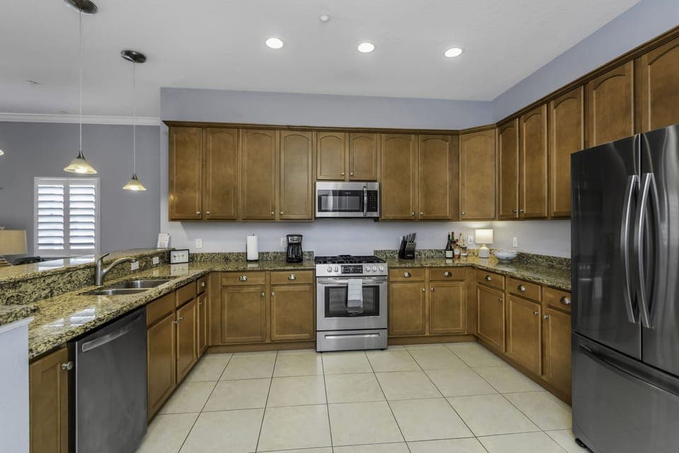Large kitchen fully stocked with everything you need to enjoy meals at home.