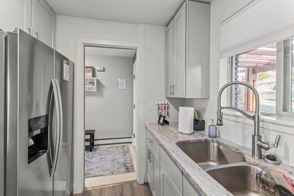The kitchen is by the front door.