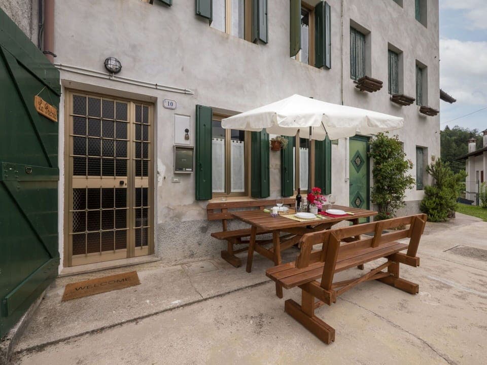 Building, Table, Property, Window, Outdoor Bench, Shade, Outdoor Table, Road Surface, Outdoor Furniture, Wood