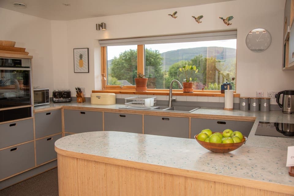 Modern and well equipped spacious kitchen with everything you could need. 