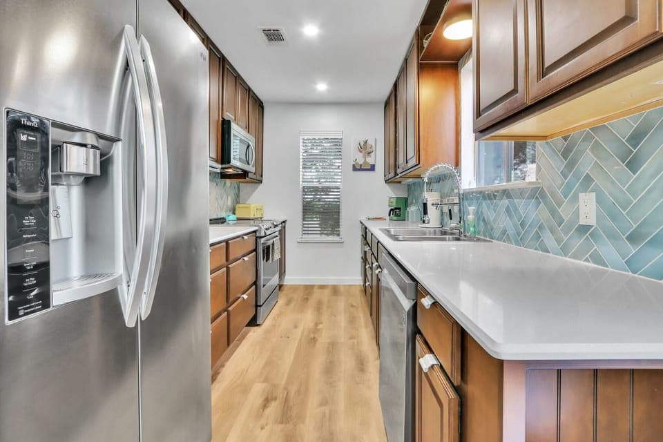 The condo has a galley kitchen.