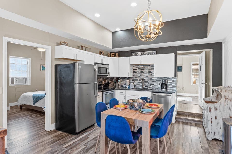Fully Stocked Kitchen and Dining Area