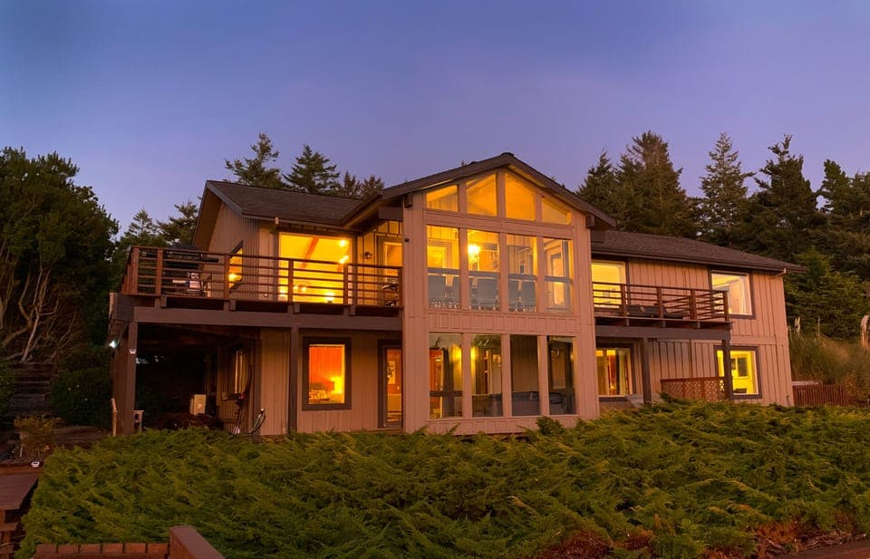 This incredible 5000-square-foot lake house features loads of outdoor spaces.