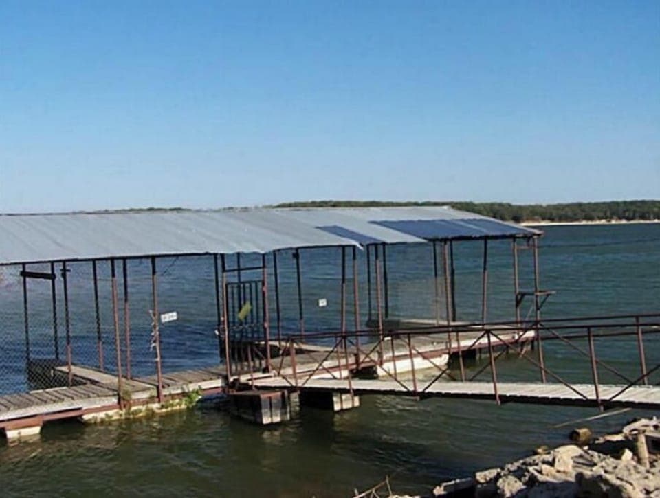 Rentable slips/dock. $5 boat ramp fee, lake boasts best Striper fishing in TX!