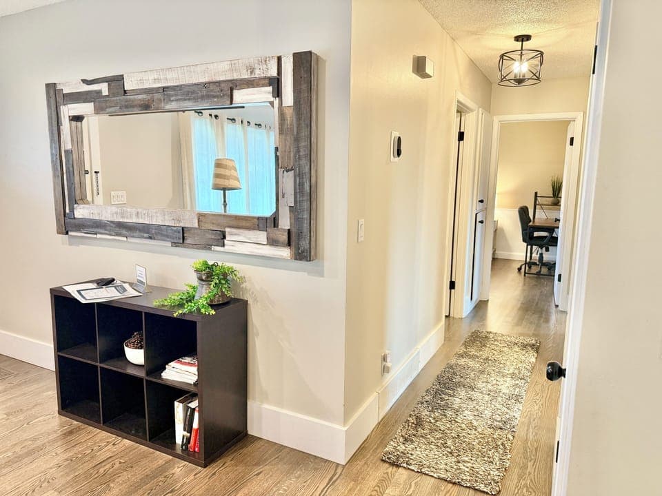 Hallway towards the bedrooms. To the left is the entry door.