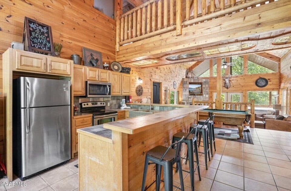 Fully equipped kitchen ready for cookouts. Custom-designed stained glass ceiling