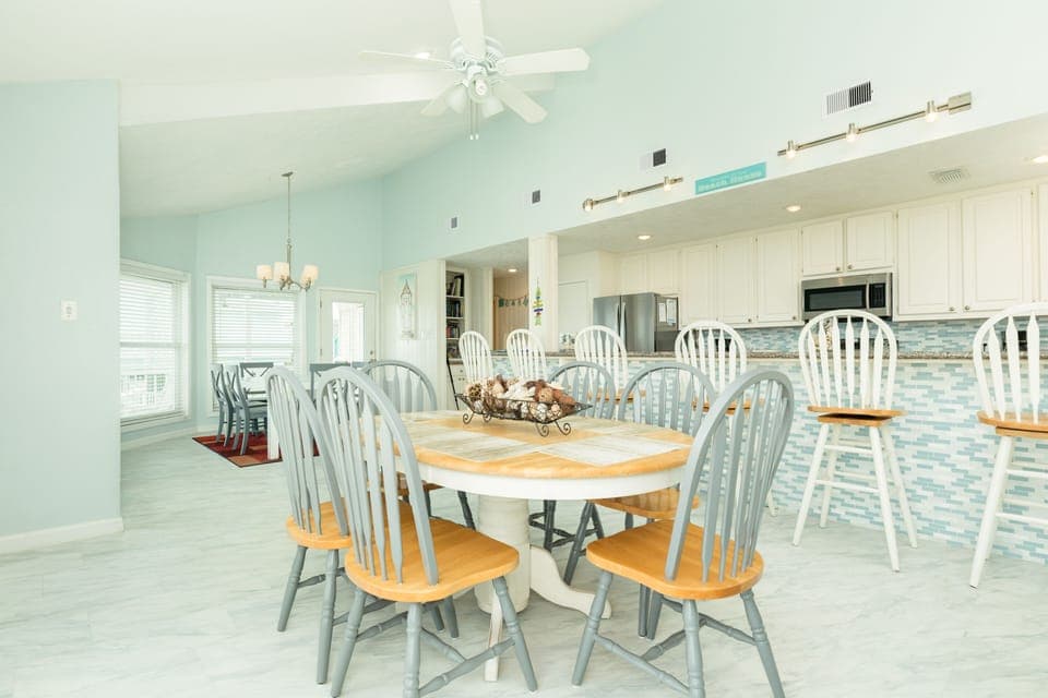 6 more can sit at the second dining table