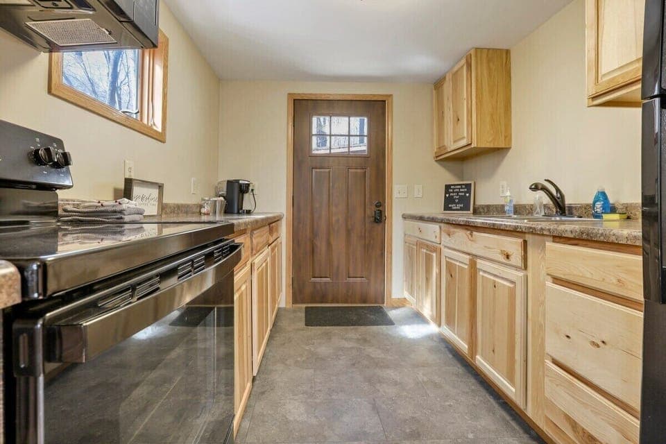 Galley kitchen with electric range