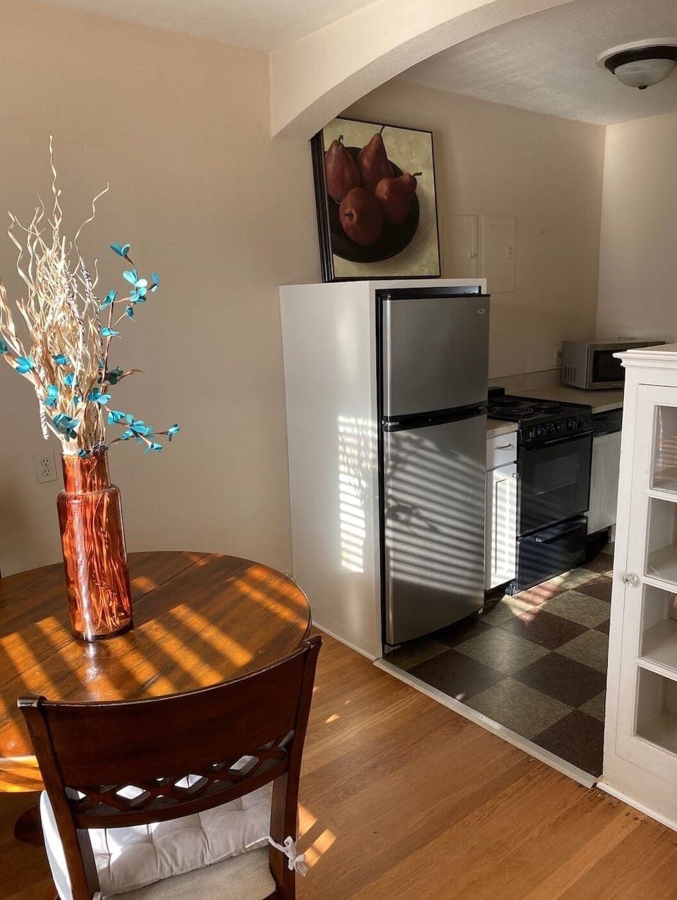 Eating Nook & stainless steel kitchen with dishwasher & double sink. 
