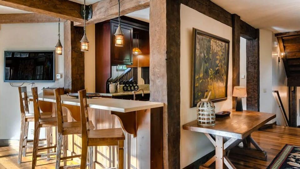 Wet bar on main level with seating for 4