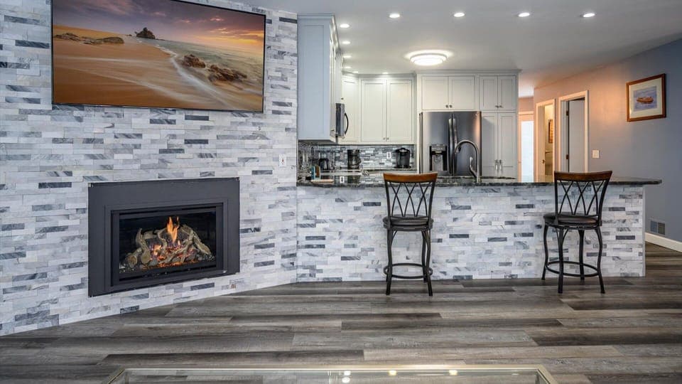 Gas fireplace offers a cozy spot to gather on the chillier days.