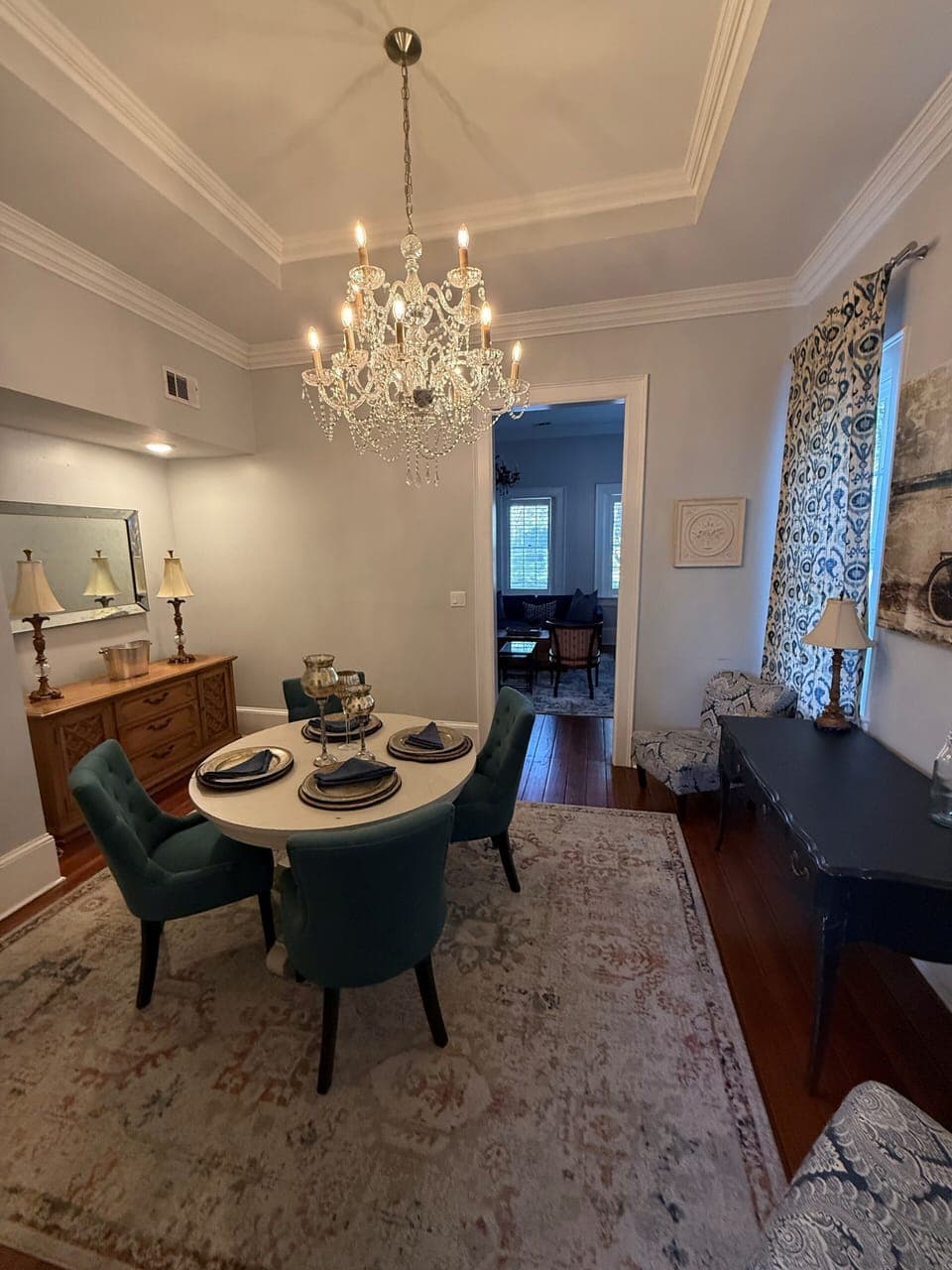 chandelier in dining room. Workspace at desk. High speed internet connection