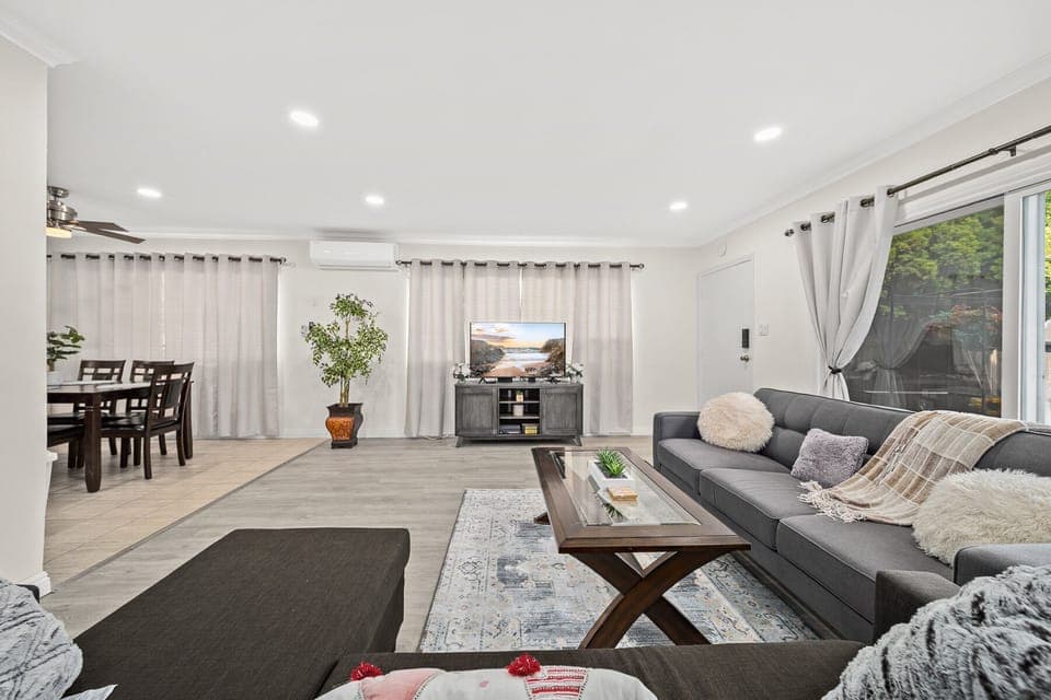 Take a break and unwind on the comfortable living room sofa.
