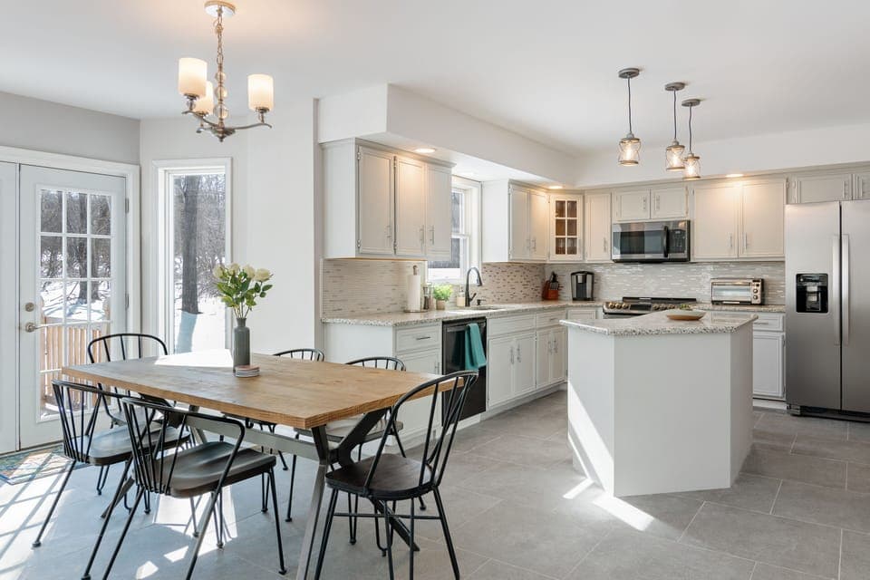 The bright and modern kitchen has everything you need to cook for a large family