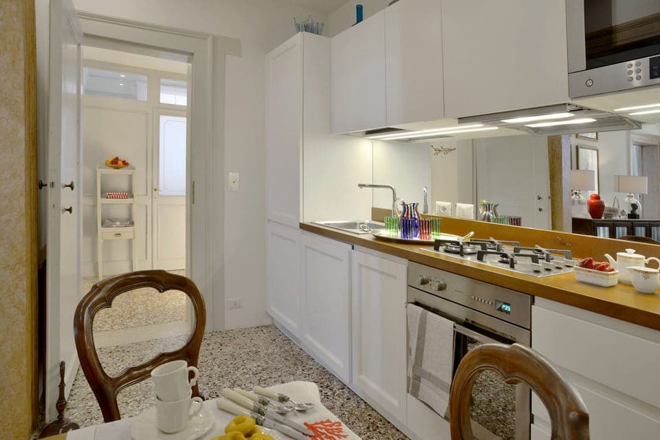 Kitchen with dining area adjoins the living room.