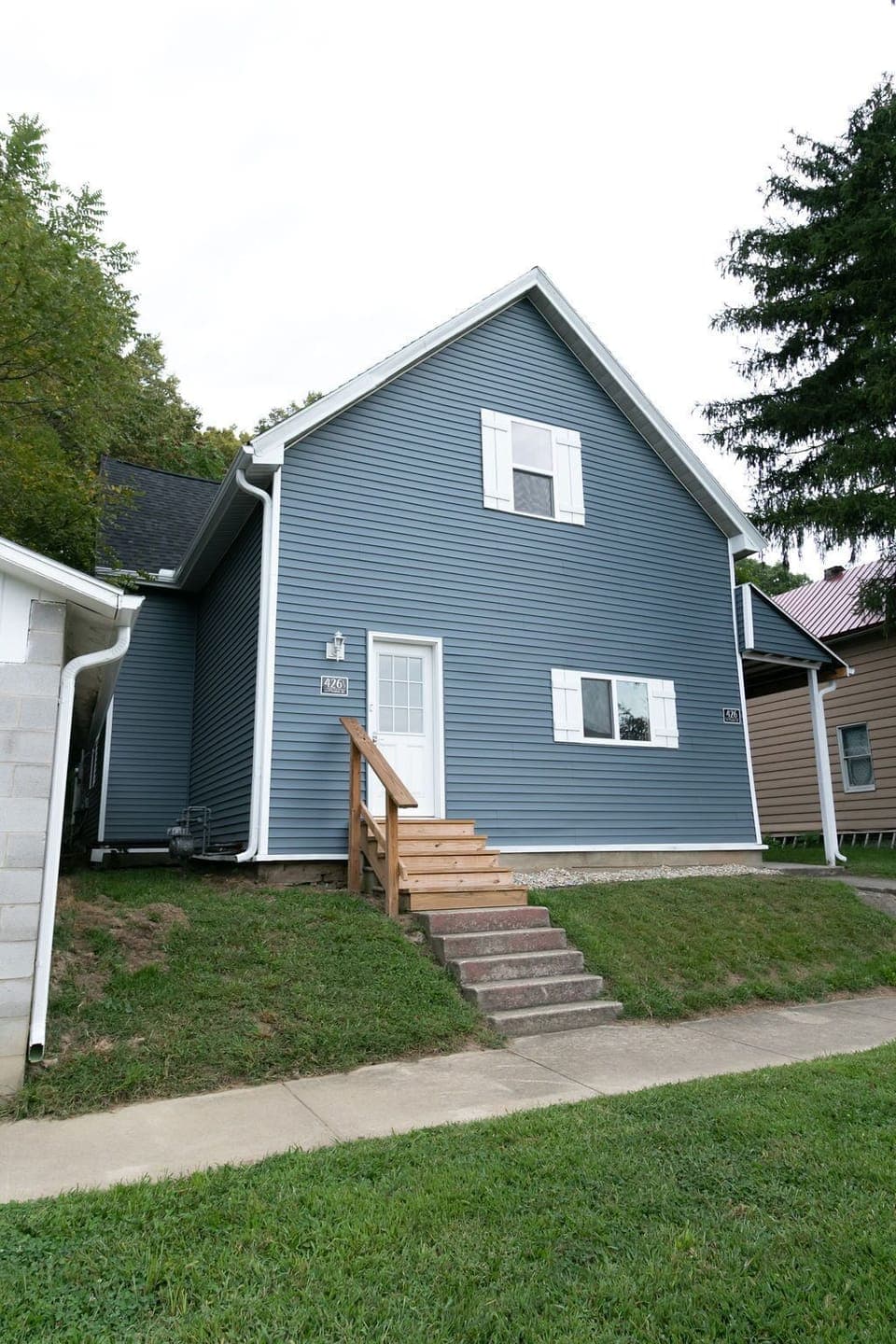 Exterior view.  Door is to the right under the porch overhang.