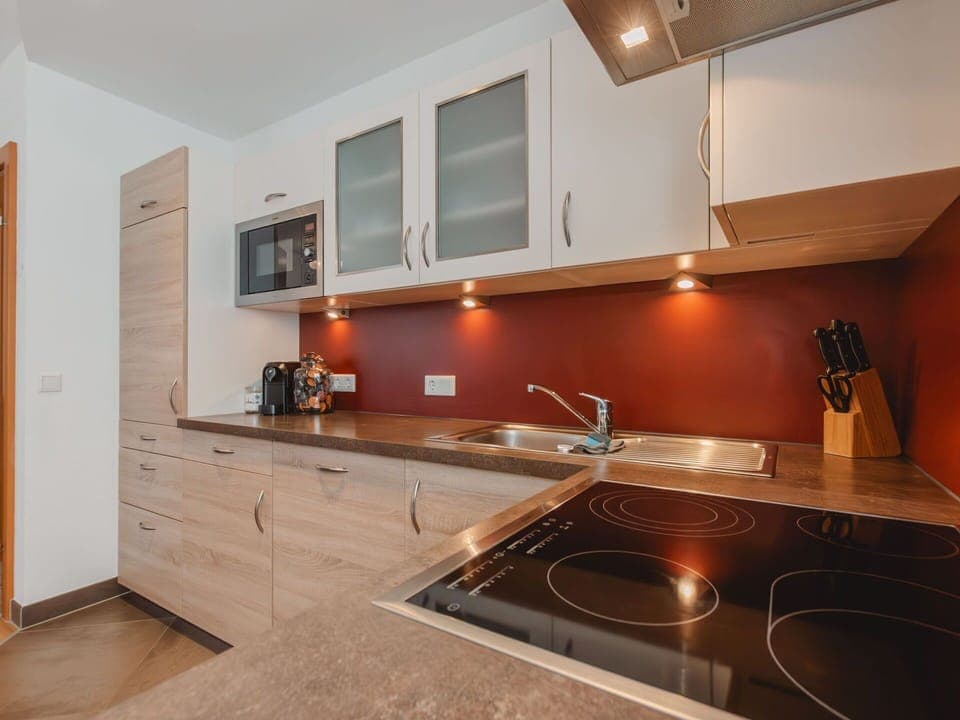 Cabinetry, Countertop, Tap, Kitchen, Building, Kitchen Stove, Plumbing Fixture, Wood, Kitchen Appliance, Sink