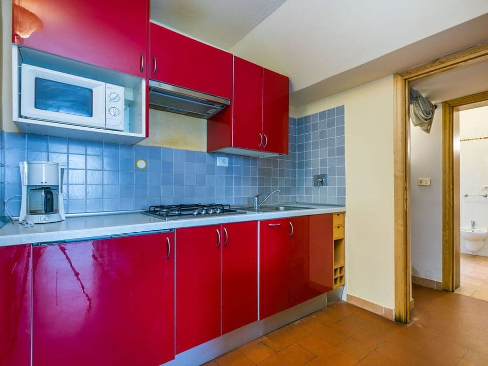 Tap, Cabinetry, Kitchen Sink, Countertop, Sink, Building, Kitchen Stove, Wood, Kitchen Appliance, Kitchen