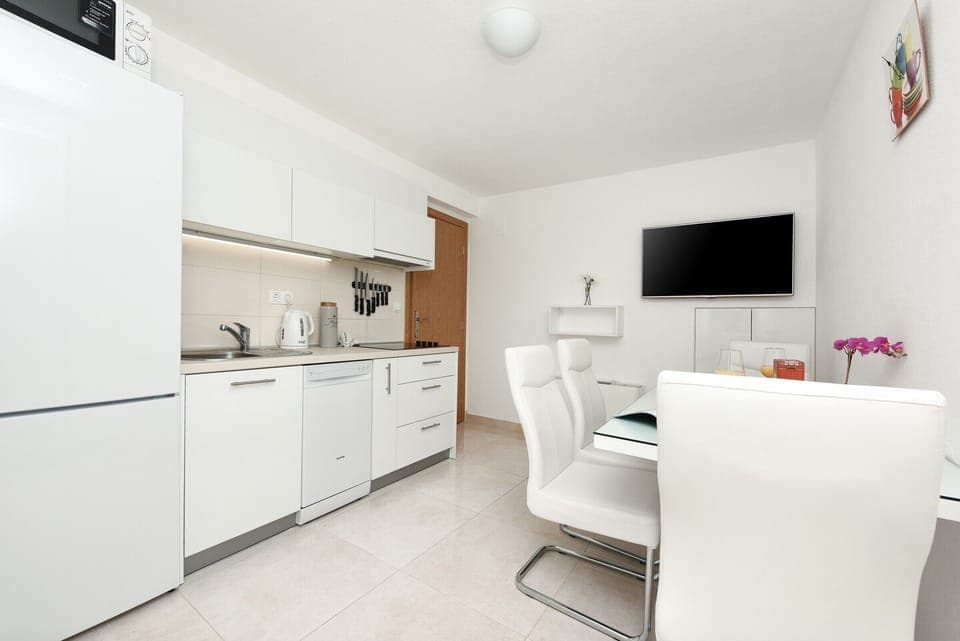 Kitchen, dining room, TV set