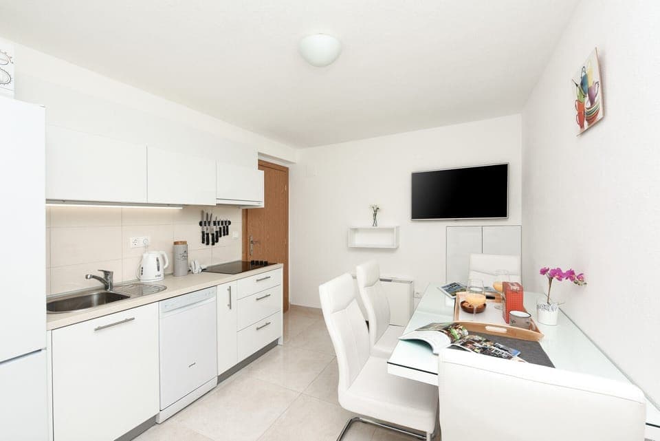 Kitchen, dining arae, TV set