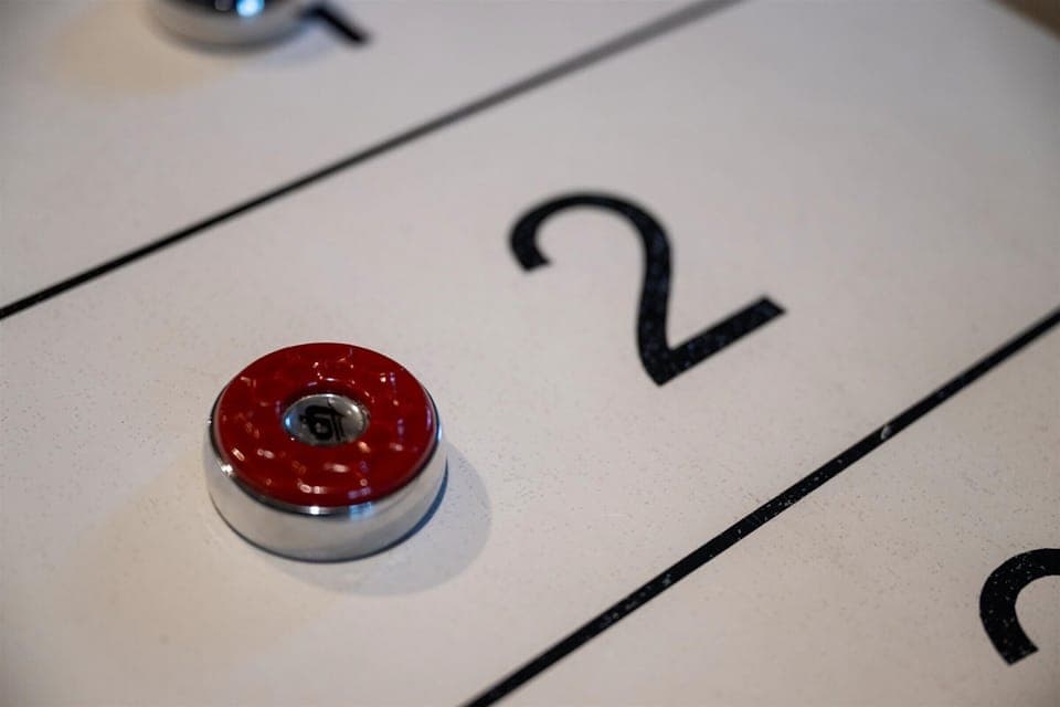 Game room lower level. Enjoy shuffleboard, wall checkers, card games, or air hockey.