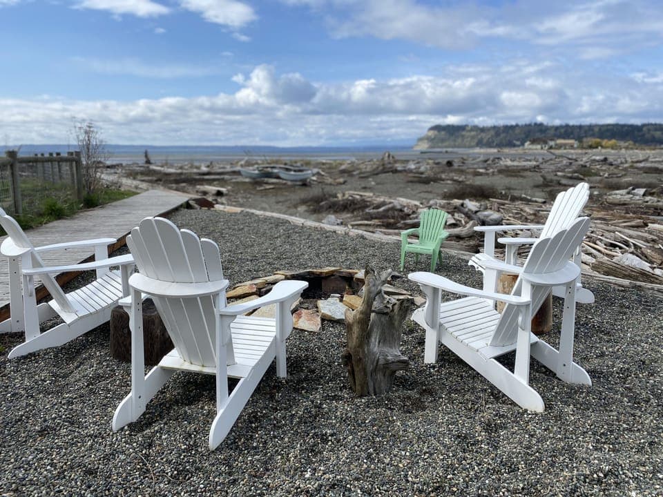 Private fire pit overlooking the bay and Olympic Mountains.