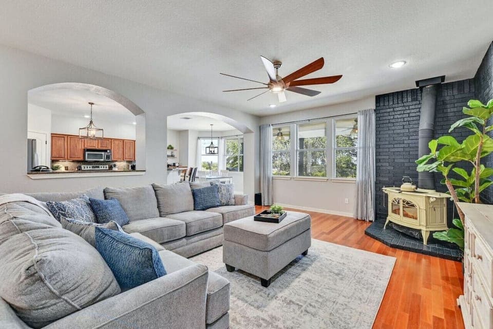 Spacious family room with natural light in your Liberty Hill vacation rental