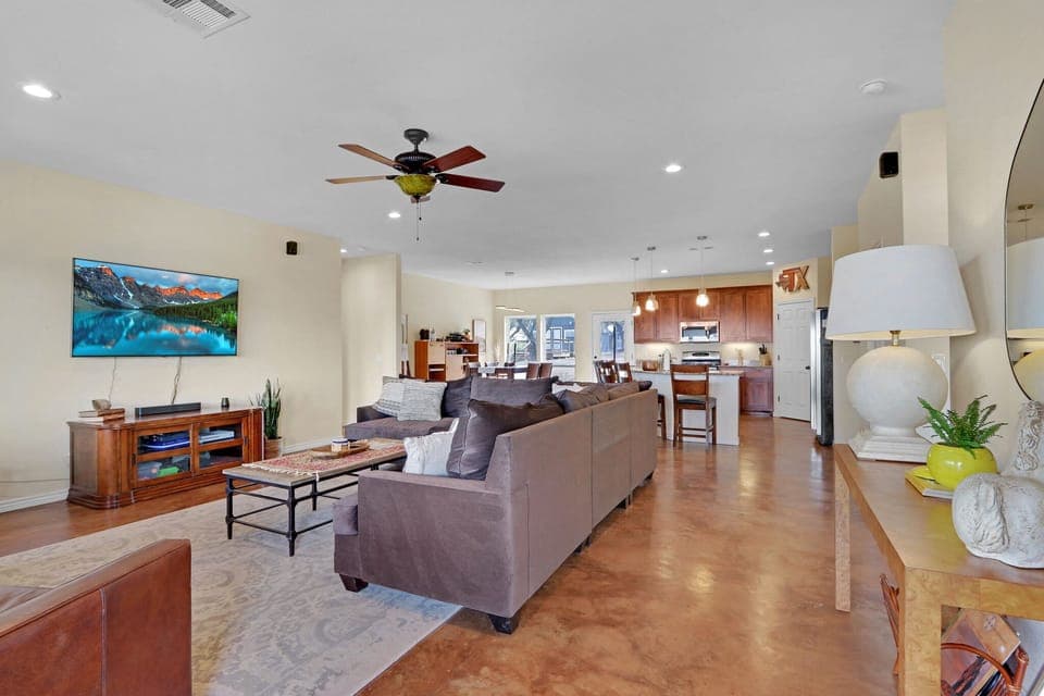 View from the entry door of the main  house which opens into the living room.  The kitchen is beyond the living room.