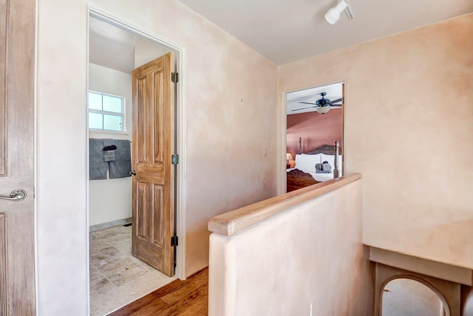 Upper Level Hallway and Shared Bath