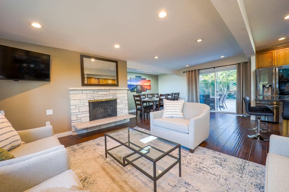 Living room, with four pull out sleeper twin armchairs.