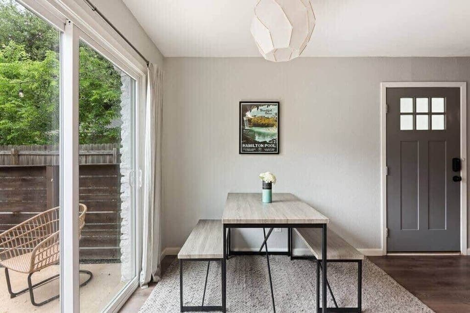 Dining area with access to private patio