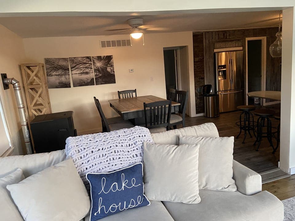 Dining table seating for 6 + 3 stools at counter.