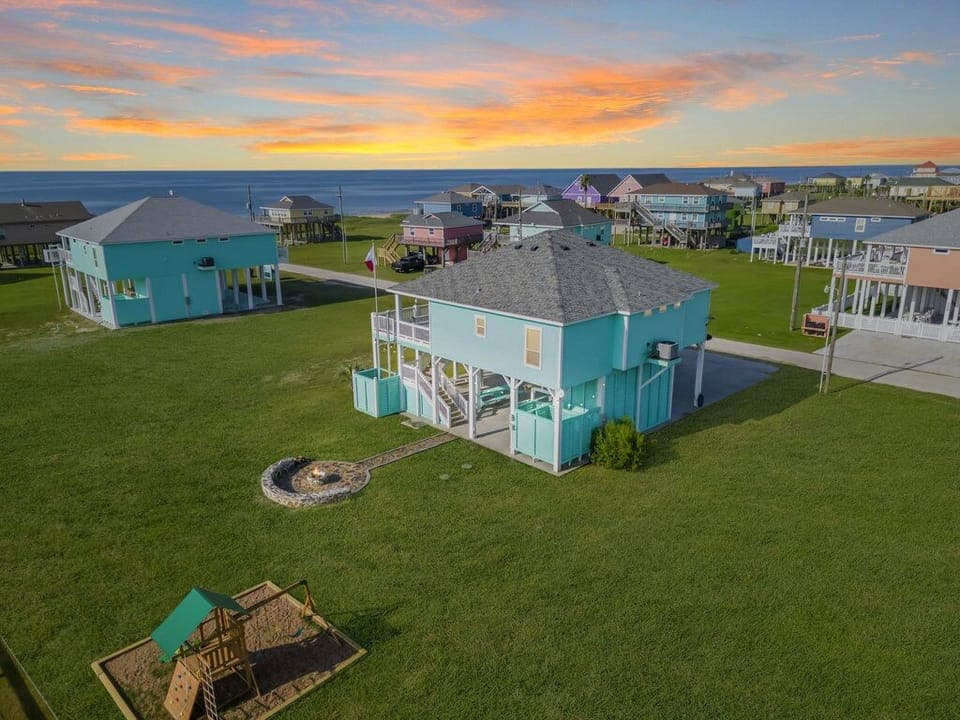 Direct beach access, private fire pit and kids playset