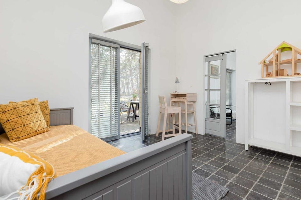 The bedroom's sofa bed provides extra sleeping space.