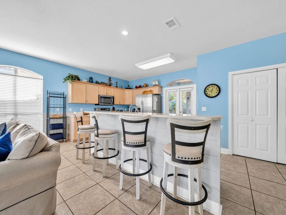 Open Kitchen Area With Bar Stools, Great For Entertaining