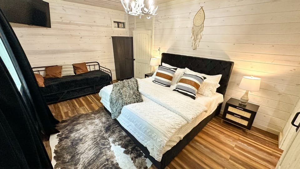 Experience ultimate comfort and privacy in Bedroom 4's serene setting, equipped with a king bed and a private bathroom.