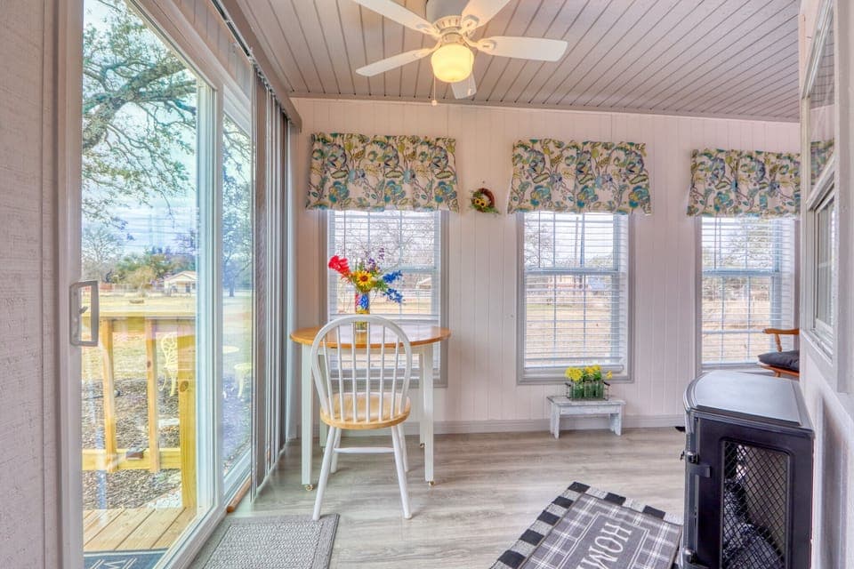 View Alternate view of sunroom and entry.