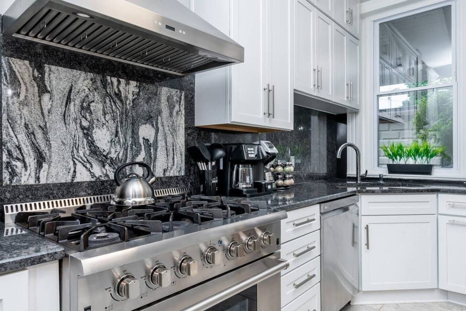 Fully stocked kitchen with top-of-the-line Thermador high-end range, dual coffee machine and more. 