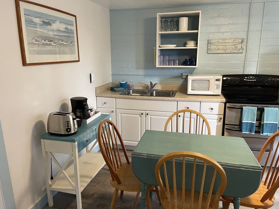 Well stocked kitchen with most anything you need to prepare and serve a meal. 