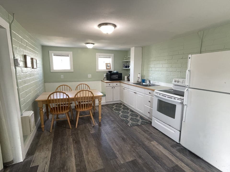 Well stocked kitchen with most anything you need to prepare and serve a meal. 