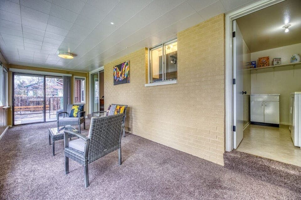 The backyard is easily accessible through the private sunroom.