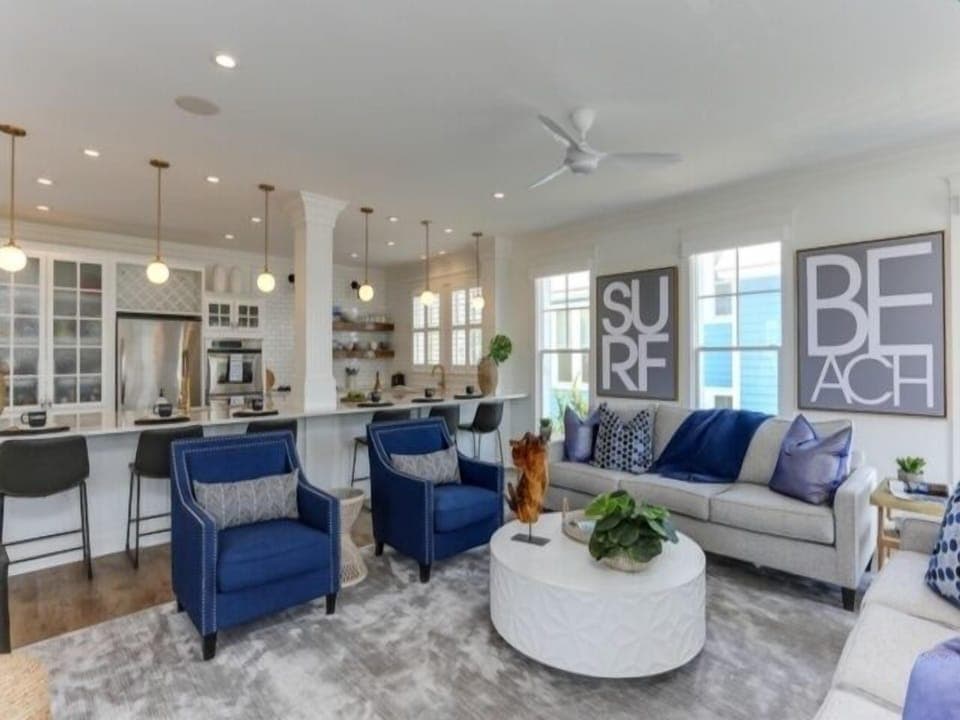 Furniture, Indoors, Rug, Table, Ceiling Fan