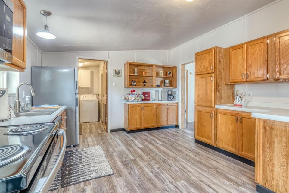 Stocked with dishes, cutlery, glassware, and cooking basics for your convenience.