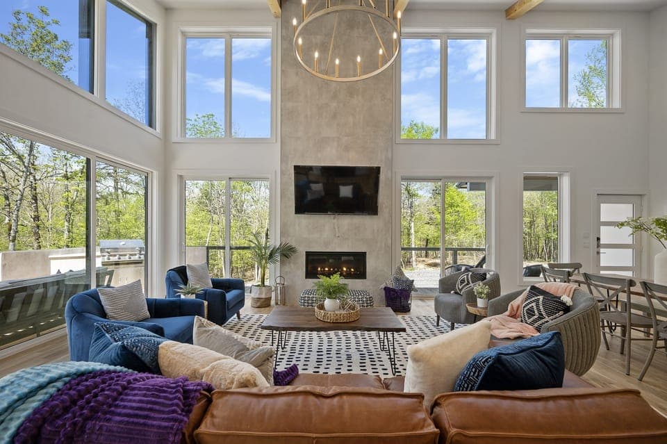 Living Room: Sunlit space with chic decor, perfect for gatherings and serene views of nature!