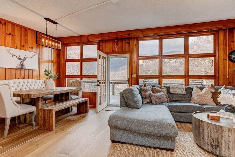 Comfy Couch, large dining table, and those views!