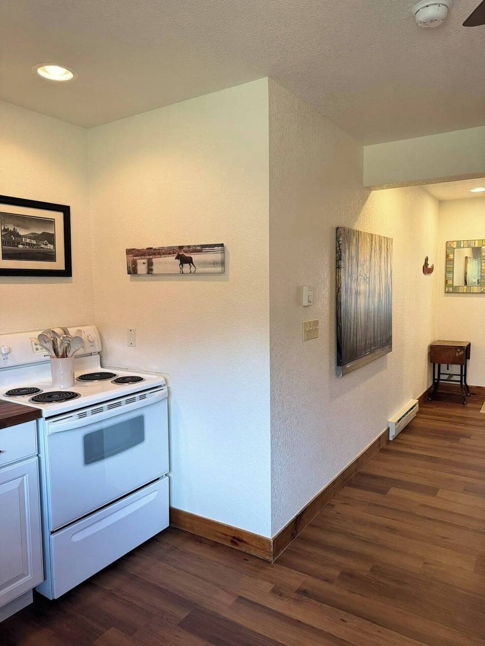 Enjoy preparing your favorite meals in the fully equipped kitchen with modern appliances, including a fridge, microwave, and gas stove. Ideal for home-cooked meals during your Grand Lake retreat.
