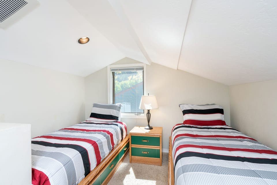Loft features two twin beds.