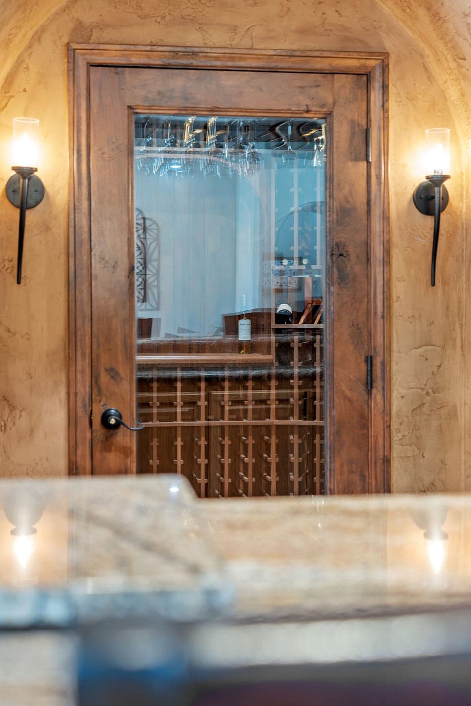 Private wine cellar, fully stocked with wine made from grapes grown on property